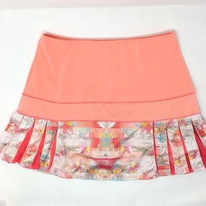 LUCKY IN LOVE TENNIS RUNNING SKORT CORAL SZ M